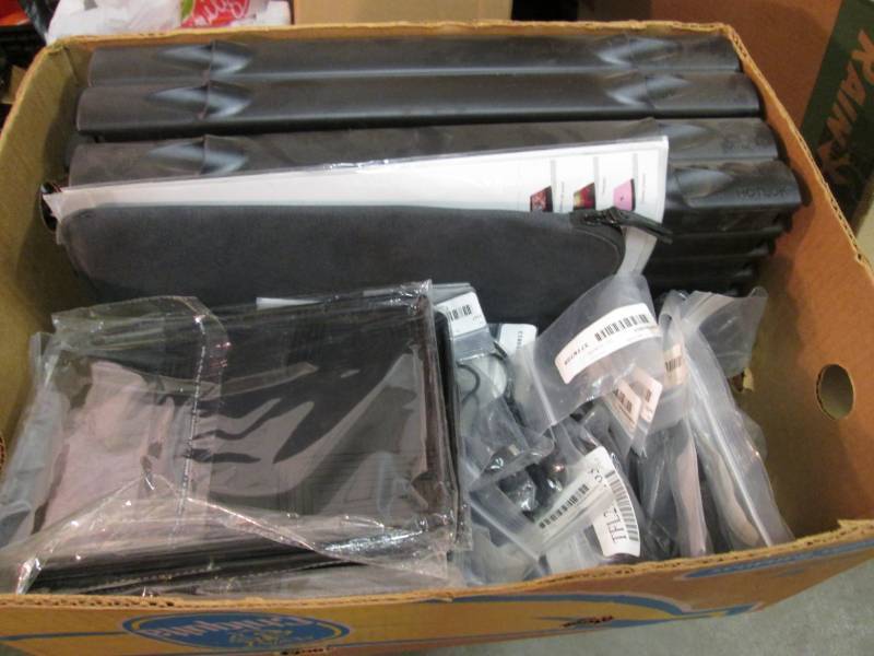 lot 40 image: Box Full of Phone and Tablet Covers...