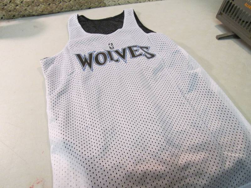 lot 106 image: Russell Athletics NBA Reversible Ti...