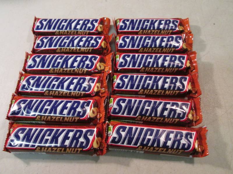 lot 247 image: 12 Snickers & Hazelnut Candy Bars B...