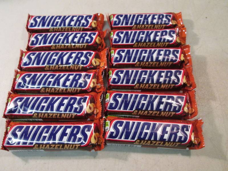 lot 248 image: 12 Snickers & Hazelnut Candy Bars B...
