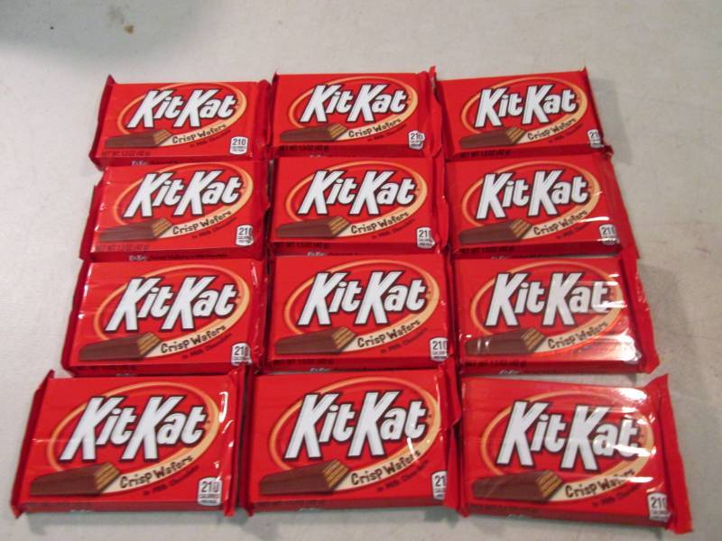 lot 249 image: 12 Kit Kat Candy Bars Best by Dec 2...