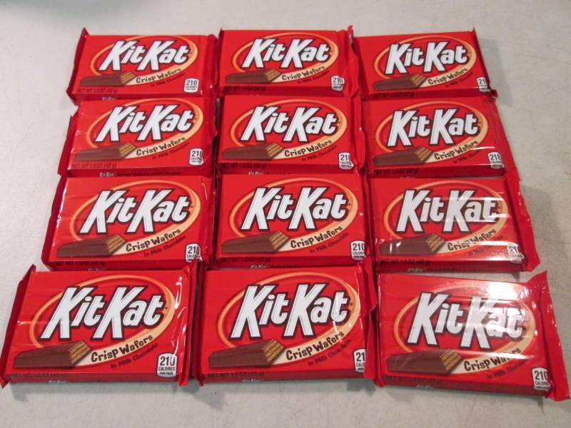 lot 250 image: 12 Kit Kat Candy Bars Best by Dec 2...