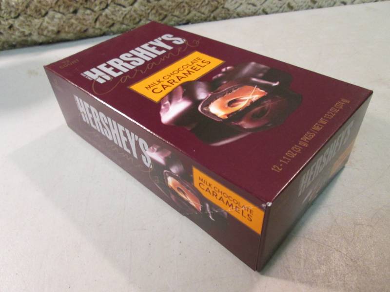 lot 257 image: Box of 12 Hersheys Caramels Best by...