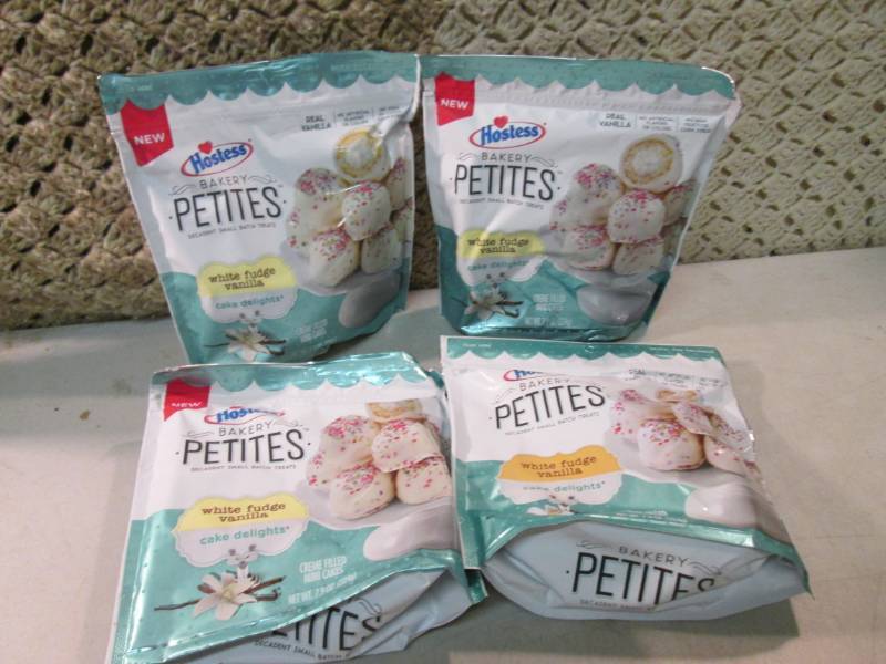 lot 279 image: 4 Bags of Hostess White Fudge Vanil...