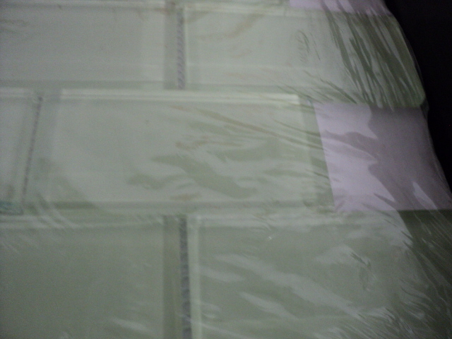 5 pieces of mint green subway tile...
