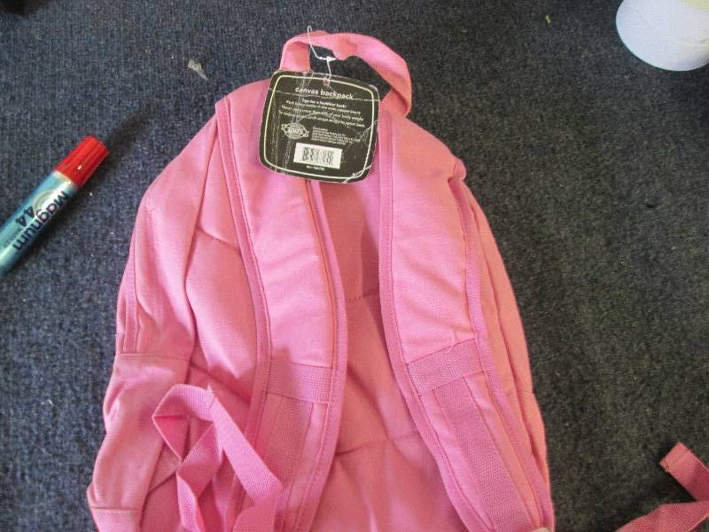 pink canvas bagpack...