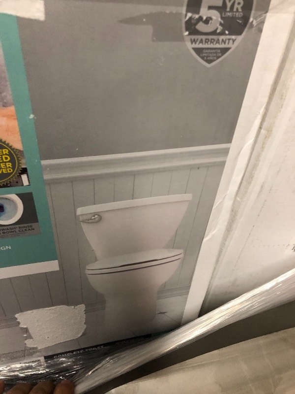 American Standard  Cadet 3 Tall Height Complete 2-Piece 1.28 GPF Single Flush Round Toilet in White with Slow Close Seat  not used