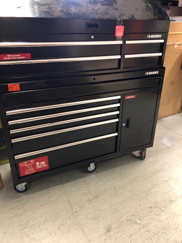 Husky  61 in. W x 18 in. D 10-Drawer 1-Door Tool Chest and Cabinet Combo in Black NOT USED WHIT DAMAGE AND NEED NEW LOCK FOR THE BOTTON PART TO OPEN ALL THE DOORS