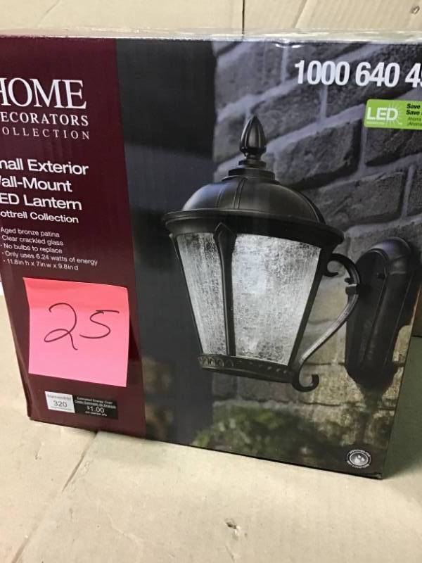 lot 25 image: Home Decorators Collection Aged Bronze Patina Outdoor LED Wall Lantern open box in like new condition