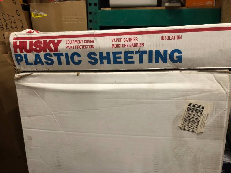 lot 64 image: HUSKY 10 ft. x 50 ft. Clear 6 mil Plastic Sheeting open box not used