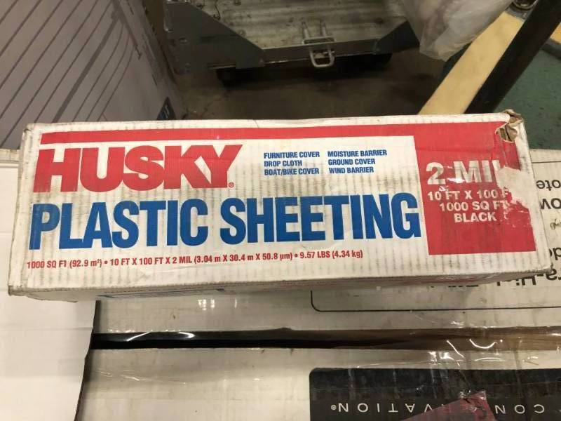 lot 71 image: HUSKY 10 ft. x 100 ft. Black 2 mil Plastic Sheeting not used