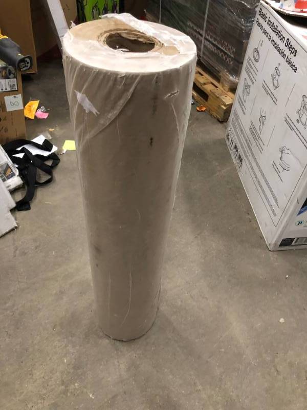 lot 94 image: Pratt Retail Specialties 36 in. x 1200 ft. 30# Paper Roll open box in like new condition