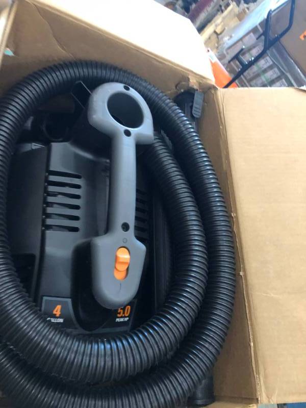 lot 98 image: RIDGID 4 Gal. 5.0-Peak HP Portable WetDry Vacuum in good condition