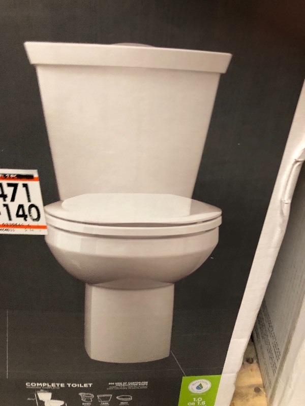 lot 102 image: American Standard  Cadet 3 Tall Height 2-Piece 1.01.6 GPF Dual Flush Elongated Toilet in White with Slow Close Seat NOT USED