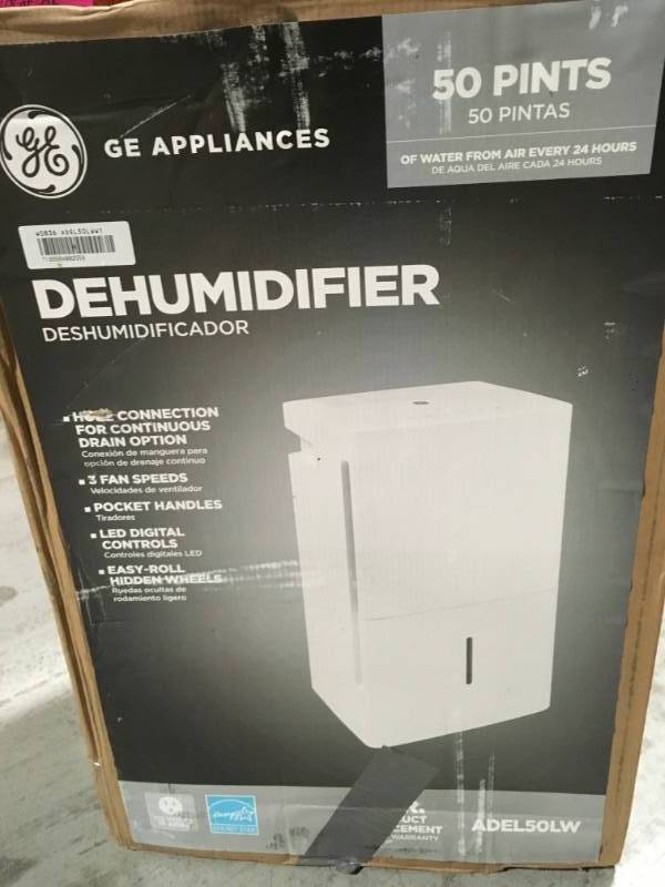 lot 5 image: GE 50 pt. Dehumidifier, open box in like new condition