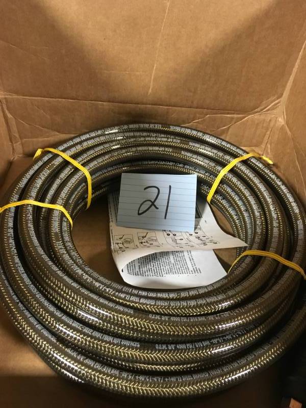 lot 21 image: Simpson 38 in. x 50 ft. Monster High Pressure Hose in very good condition