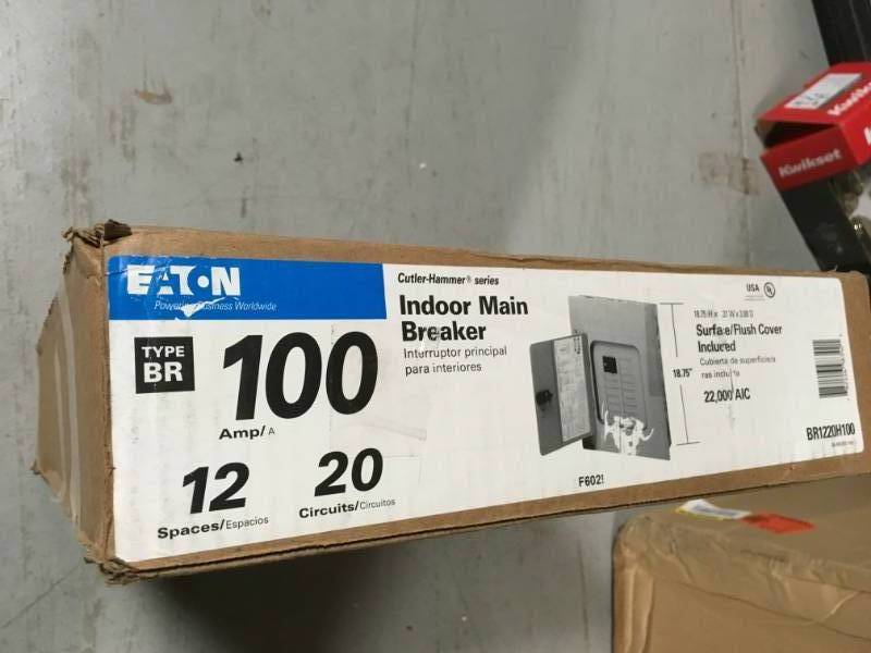 lot 45 image: Eaton BR 100 Amp 12 Space 20 Circuit Indoor 22k Main Breaker Loadcenter with Combination Cover open box in like new condition