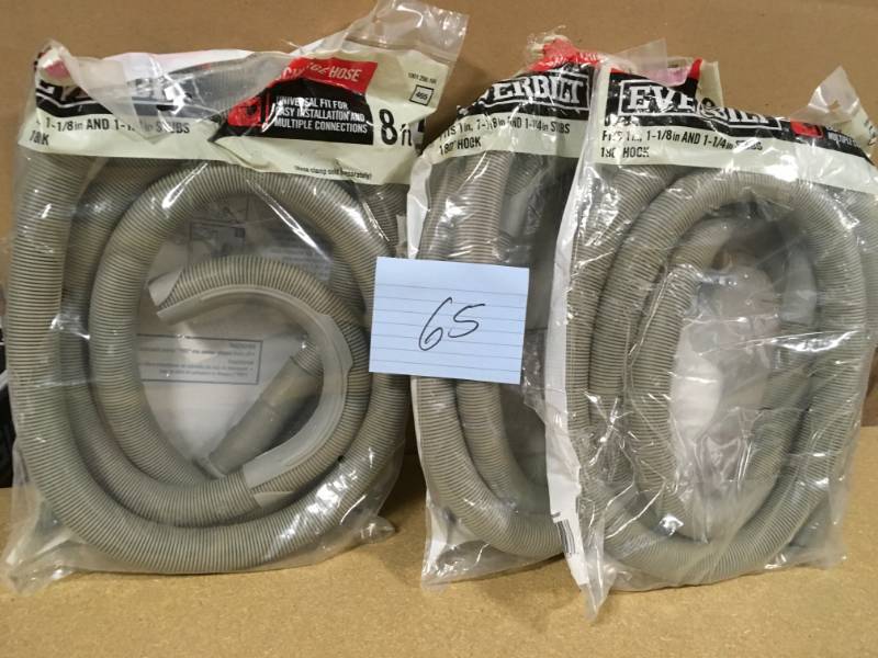 lot 65 image: Everbilt 8 ft. Corrugated Washing Machine Discharge Hose QTY 3 not used