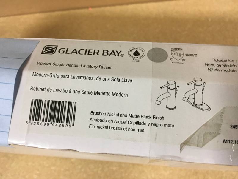lot 75 image: Glacier Bay Modern Single Hole Single-Handle Low-Arc Bathroom Faucet in Dual Finish Brushed Nickel and Matte Black open box in like new condition