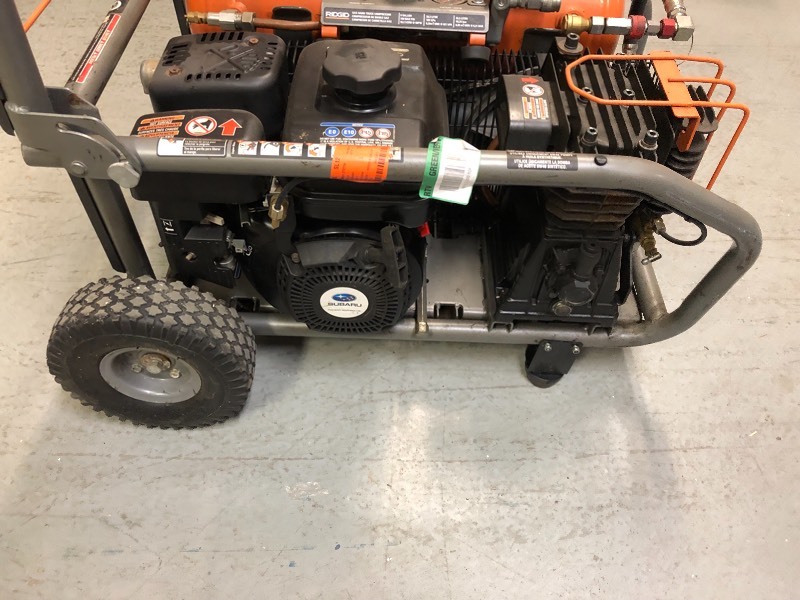 lot 101 image: RIDGID  8 Gal. Portable Gas Power Zero Gravity Air Compressor  used in working conditions