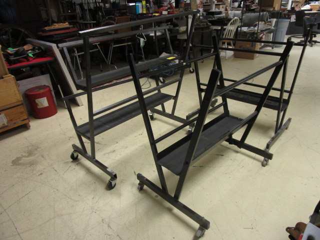 lot 517 image: 3 METAL ROLLING ART RACKS