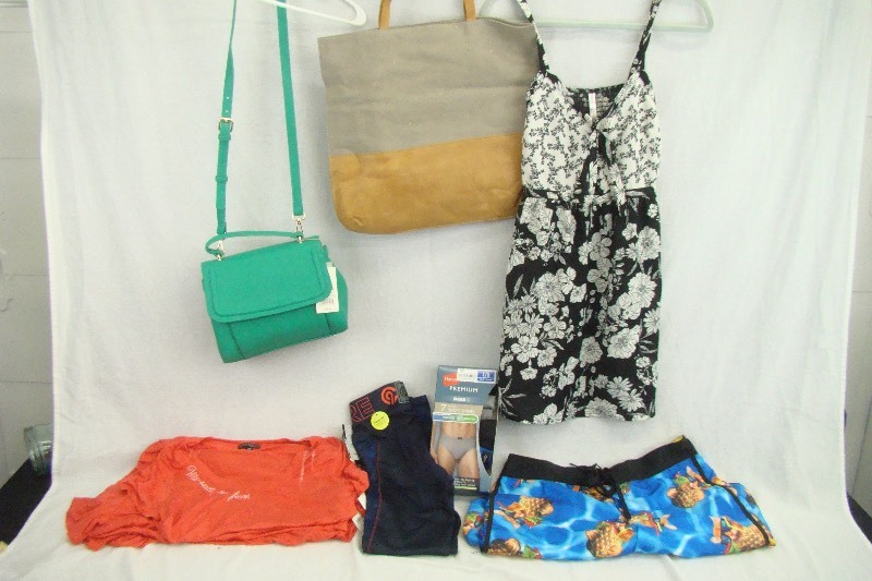 lot 38 image: Lot of New with Tags Mens and Womens Clothes, Purse etc.
