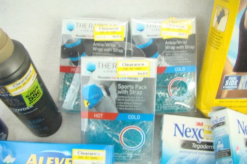 lot 47 image: Lot of New Foot, Knee, Back Pain Remedies, Hearing Aid Batteries and Heating Pad