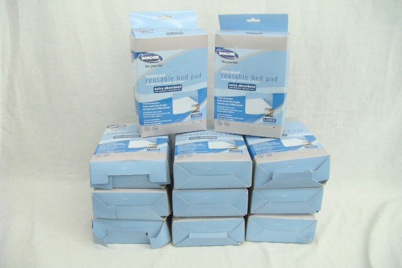 lot 49 image: Lot of 11 New in Box Extra Absorbent Reusable Bed Pads 
