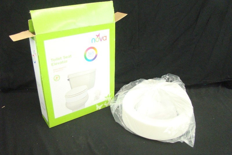 lot 64 image: New in Box Nova Toilet Seat Elevator