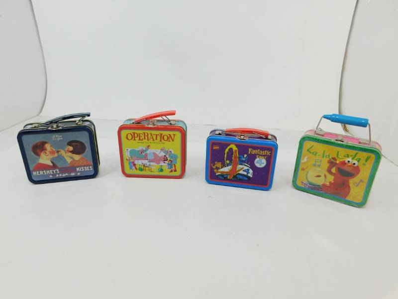 lot 23 image: One New Lunch Pail & Three Like New Lunch Pails