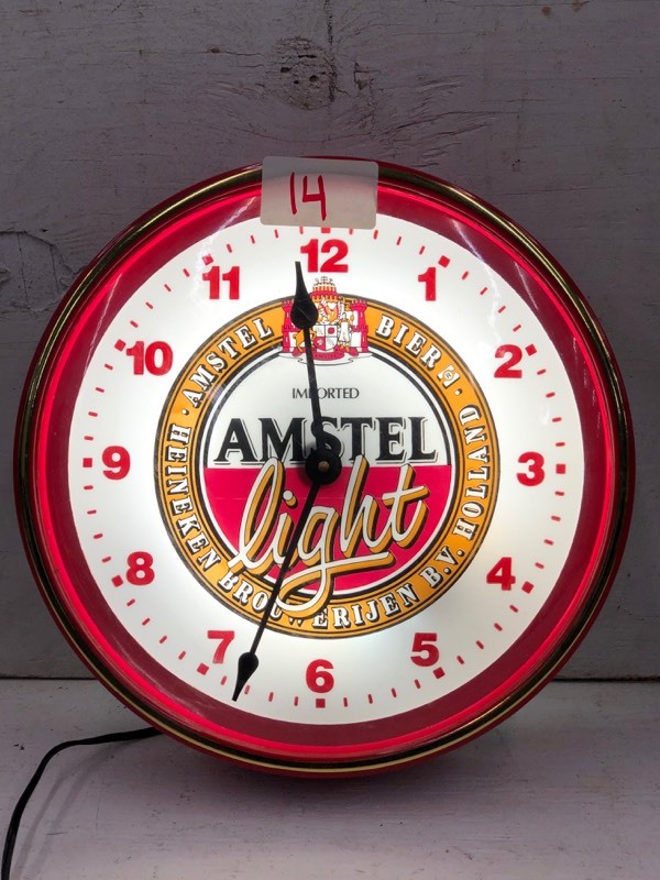 lot 14 image: Amstel Light Wall Clock