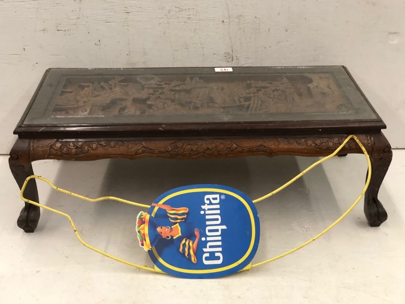 lot 43 image: Chaquita Bananas Sign & Carved Coffee Table