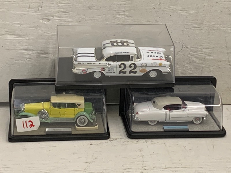 lot 112 image: (3) Die-Cast Collectible Cars With Display Cases