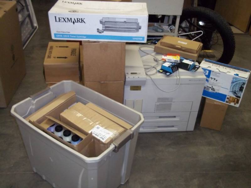 lot 52 image: HP Office Lazer Jet Printer Powers up, with lots of unused printer ink.