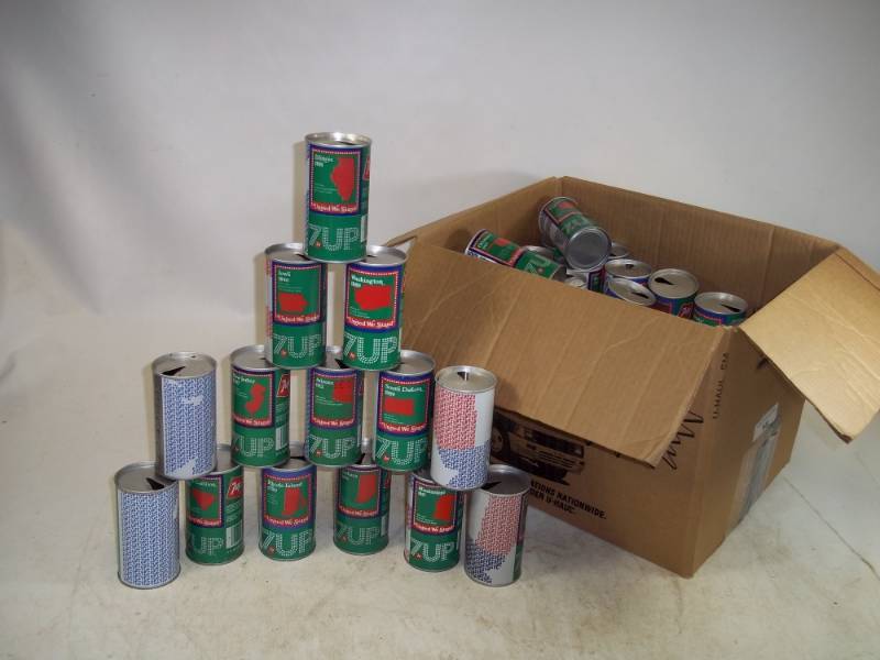 lot 55 image: 1976 Collectable 7-UP State Pop cans 60