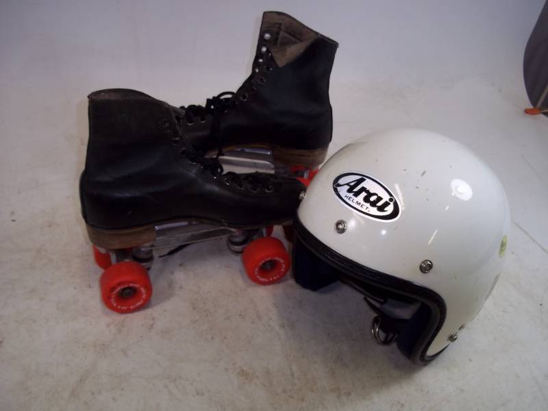 lot 63 image: Vintage  Arai Helmet with Roller derby Roller skates