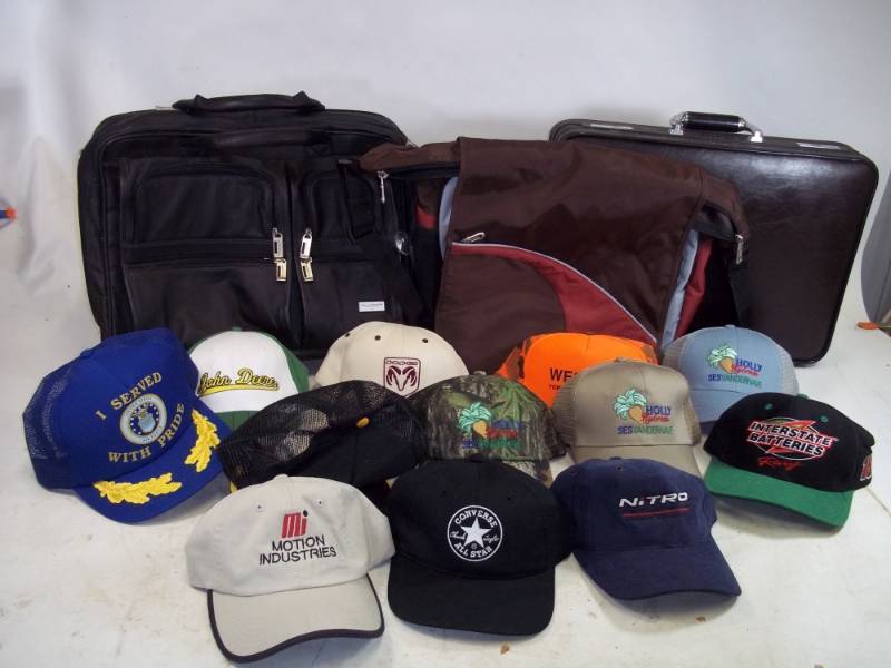 lot 91 image: Hats and Briefcases