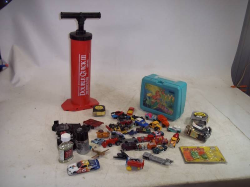 lot 233 image: Air Pump, matchbox cars, tape measures