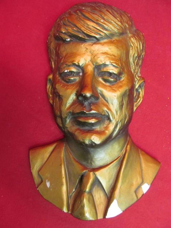 Kennedy plaster wall hanging