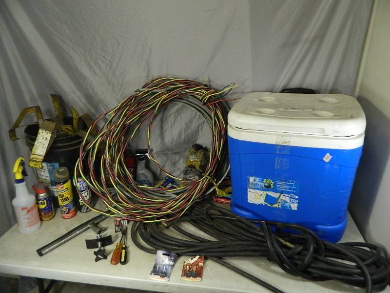 lot 92 image: Cooler, Tools, Roof Jacks, Air Hose, Electrical Wire, Etc