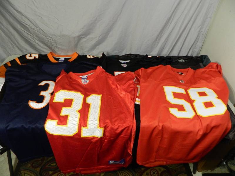 lot 101 image: 6 NFL Football Jerseys