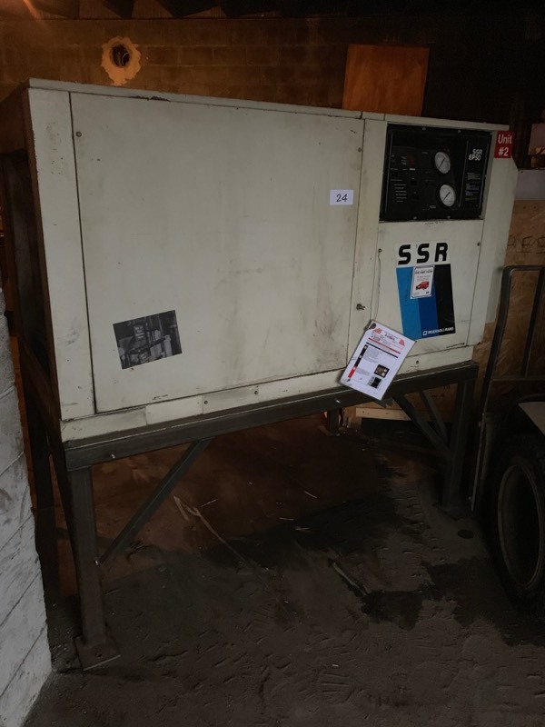 Commercial air compressor on stand