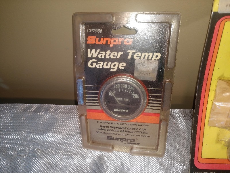 lot 53 image: Water Temp Gauge and ACCEL Part