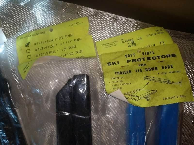 lot 58 image: NOS Snowmobile Trailer Protectors