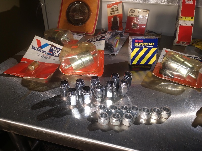 lot 26 image: Car Parts, NOS Valvoline Parts, Measuring Tapes and Other Hardware