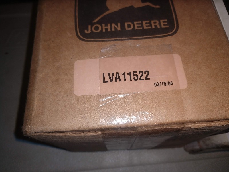 lot 64 image: John Deere Hydraulic Oil Filters LVA11522 and AR98098