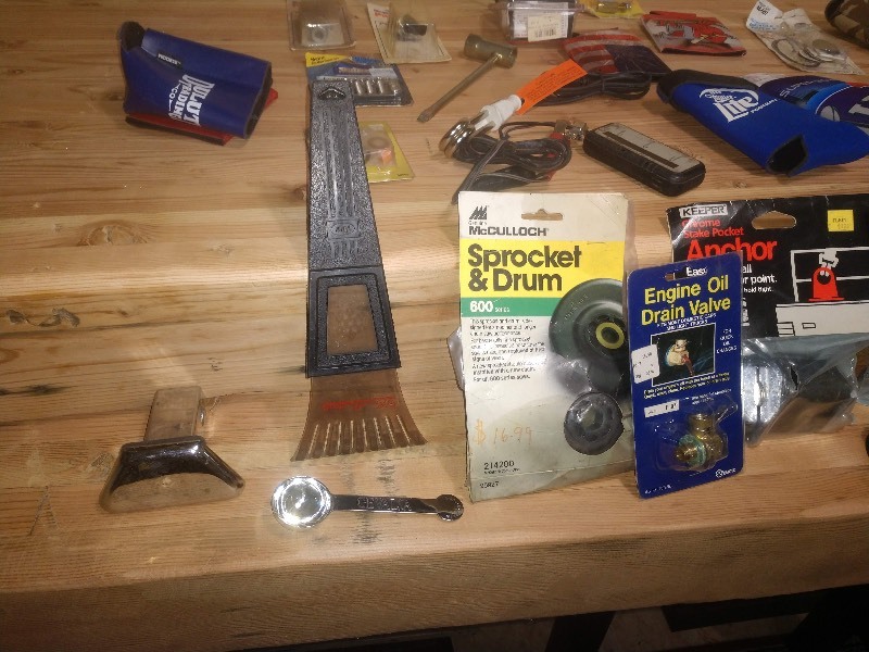 lot 81 image: Koozies, Scraper, and Other Auto Parts