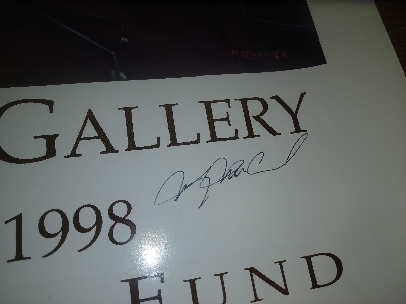 lot 99 image: Signed Harry McCormick Lincoln Del South Fingerhut Gallery Benefit For The Cancer Kids Fund Banner 1998