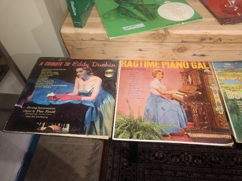 lot 118 image: Lot of Vintage Vinyls and VHS Tapes and Cassette Adapter