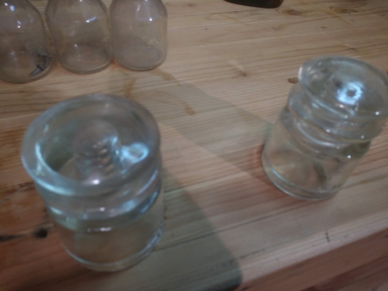 lot 121 image: Lot of Mason Jars, Glass Jars and Bottles and Antique Glass Insulators